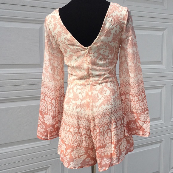 Silky ornate fully lined romper with side pockets. - Picture 3 of 5